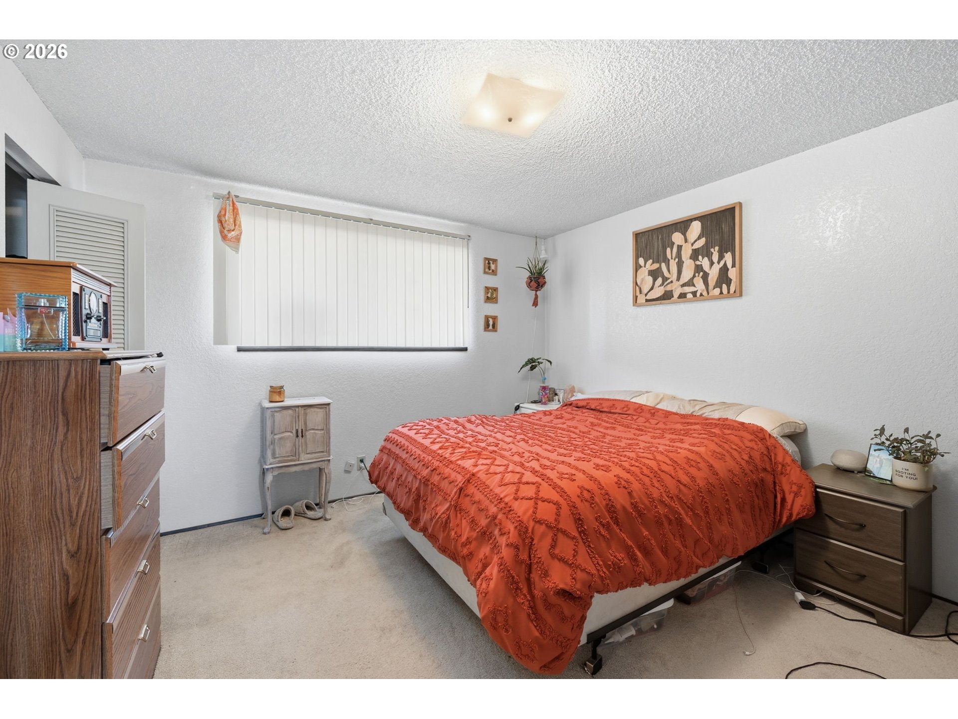 2018 Debra Drive Springfield, OR 97477 - Photo 19 of 42 a bedroom with a bed and a cabinets