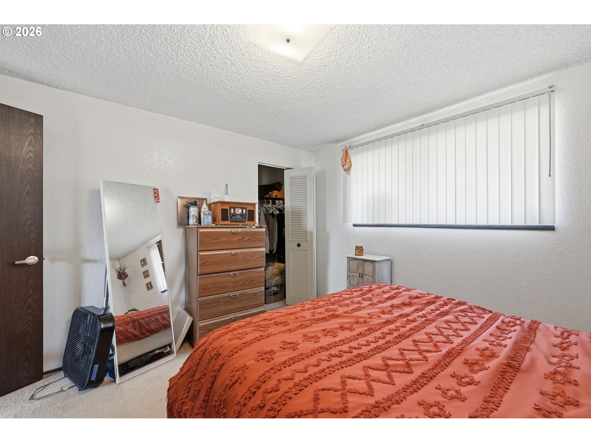 2018 Debra Drive Springfield, OR 97477 - Photo 20 of 42 a bedroom with a bed and a cabinets