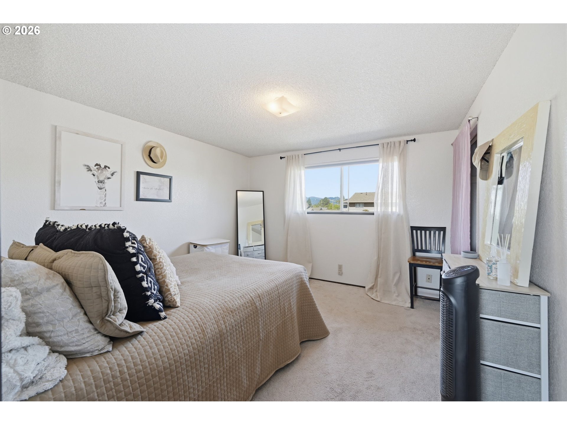 2018 Debra Drive Springfield, OR 97477 - Photo 36 of 42 a bedroom with a bed and a cabinets