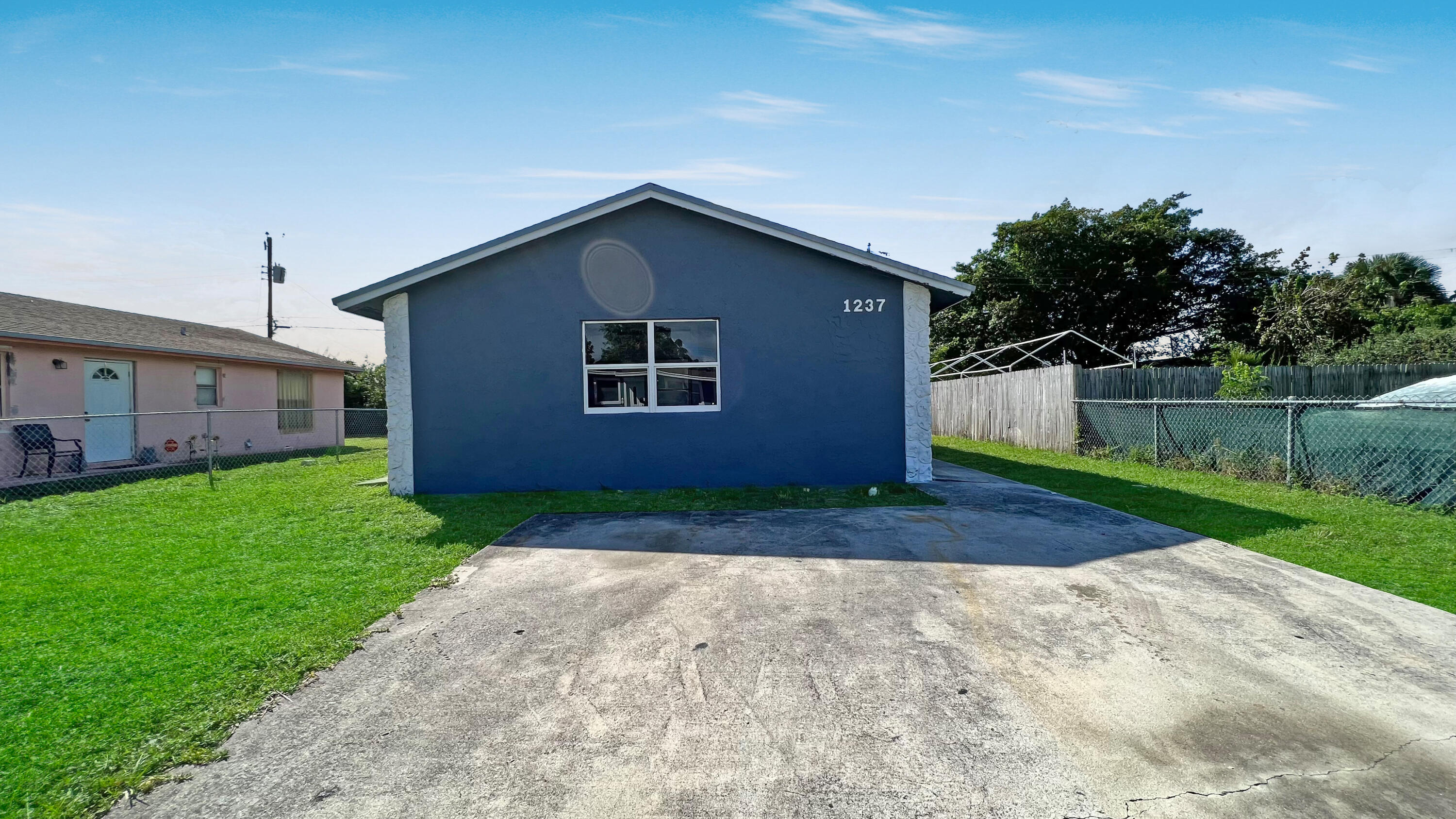 1237 West 24th Street Riviera Beach, FL 33404 - Photo 1 of 12 01