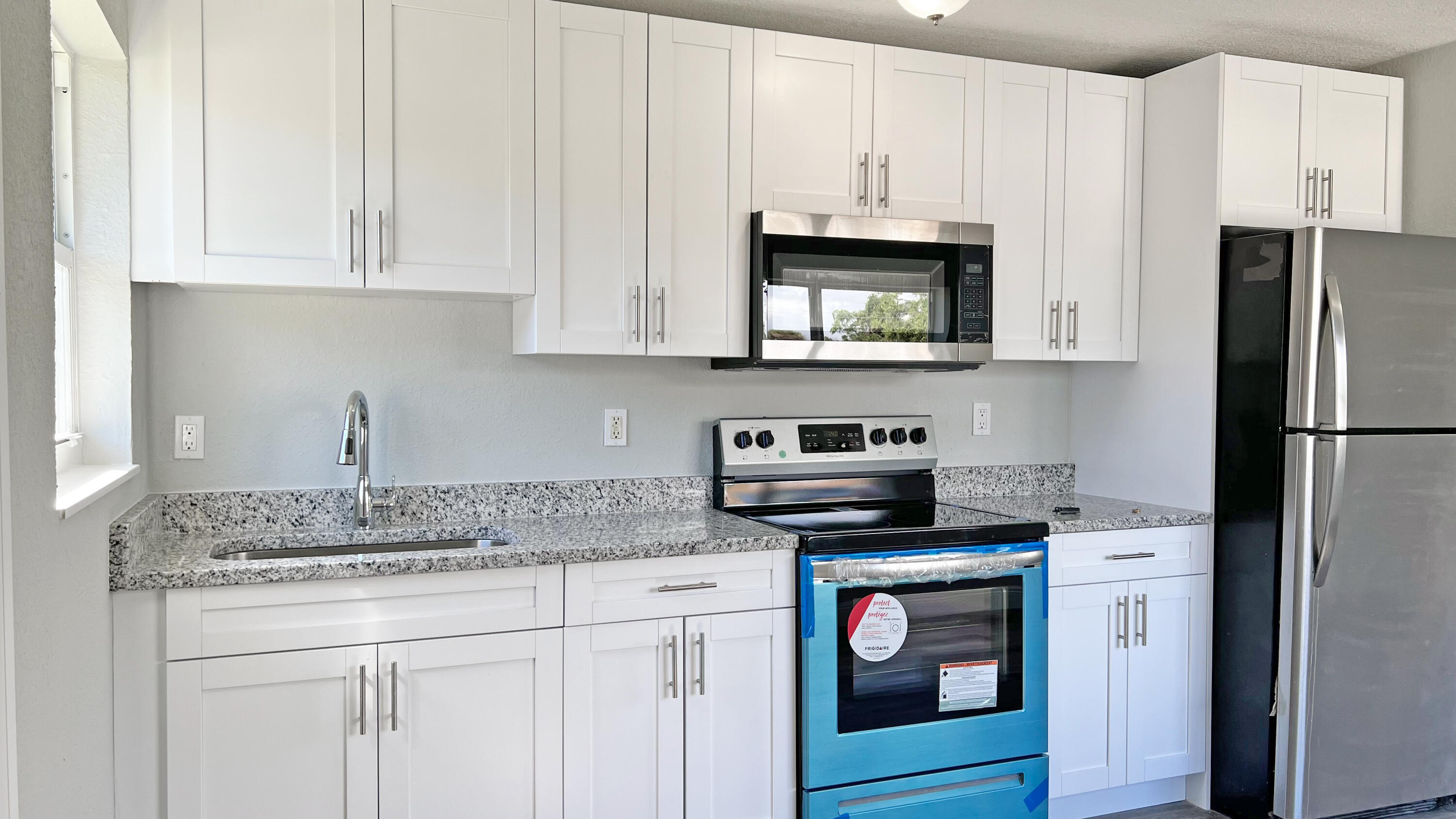 1237 West 24th Street Riviera Beach, FL 33404 - Photo 5 of 12 05