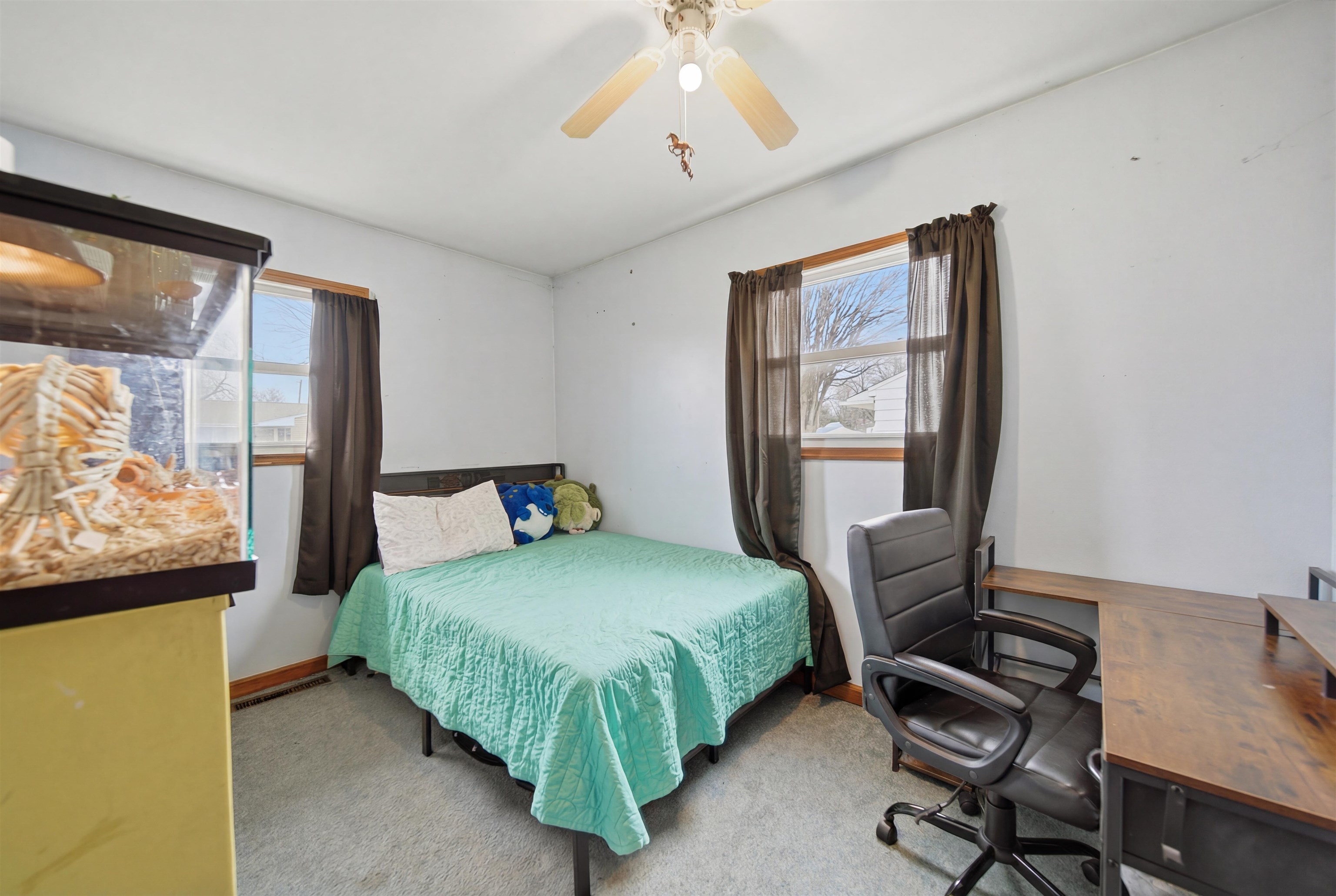 2008 East 6th Street Sterling, IL 61081 - Photo 11 of 16 a bedroom with a bed and a window
