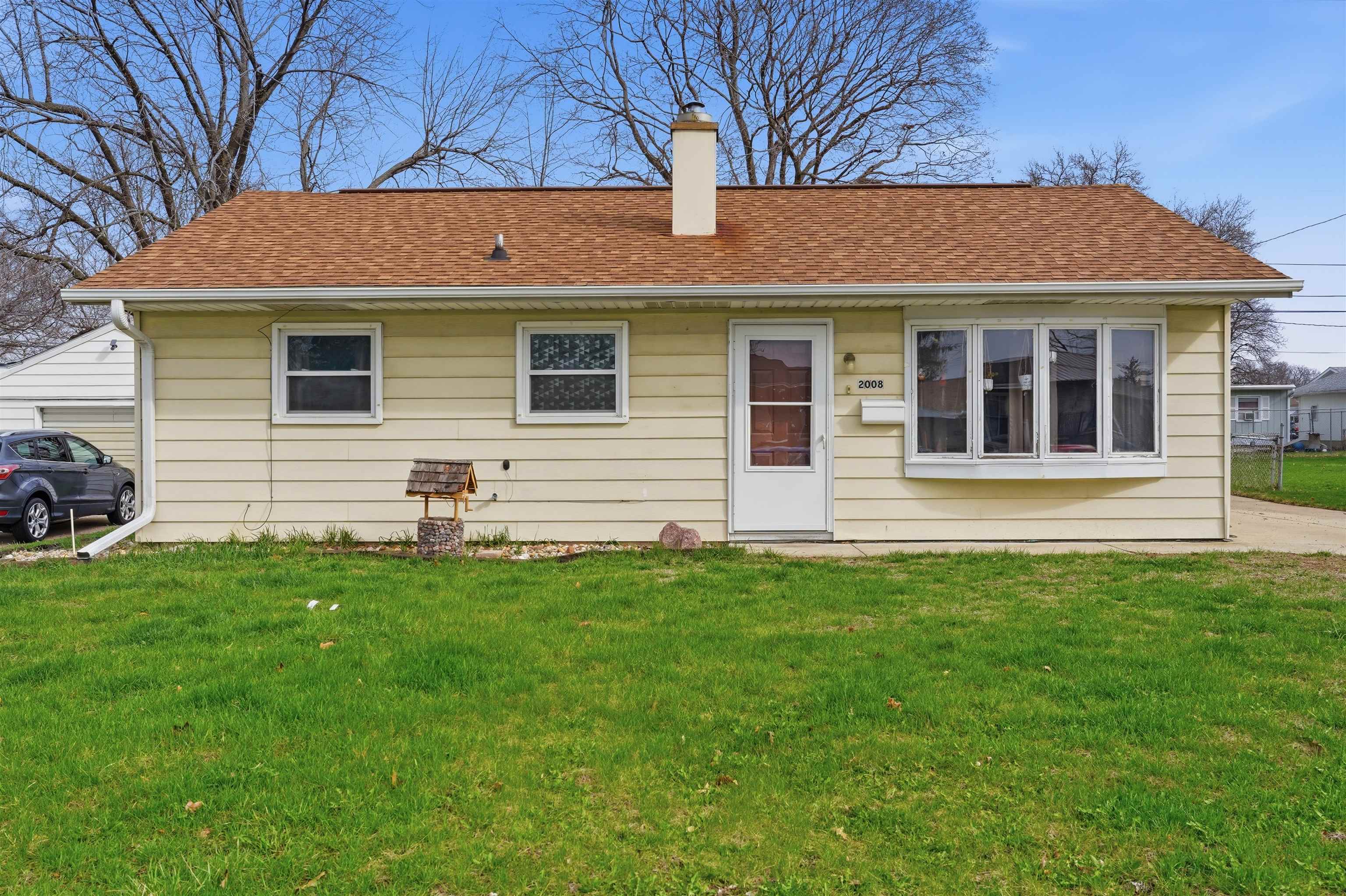 2008 East 6th Street Sterling, IL 61081 - Photo 2 of 16 a front view of a house with a yard