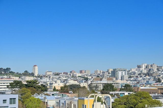 a view of a city with tall buildings