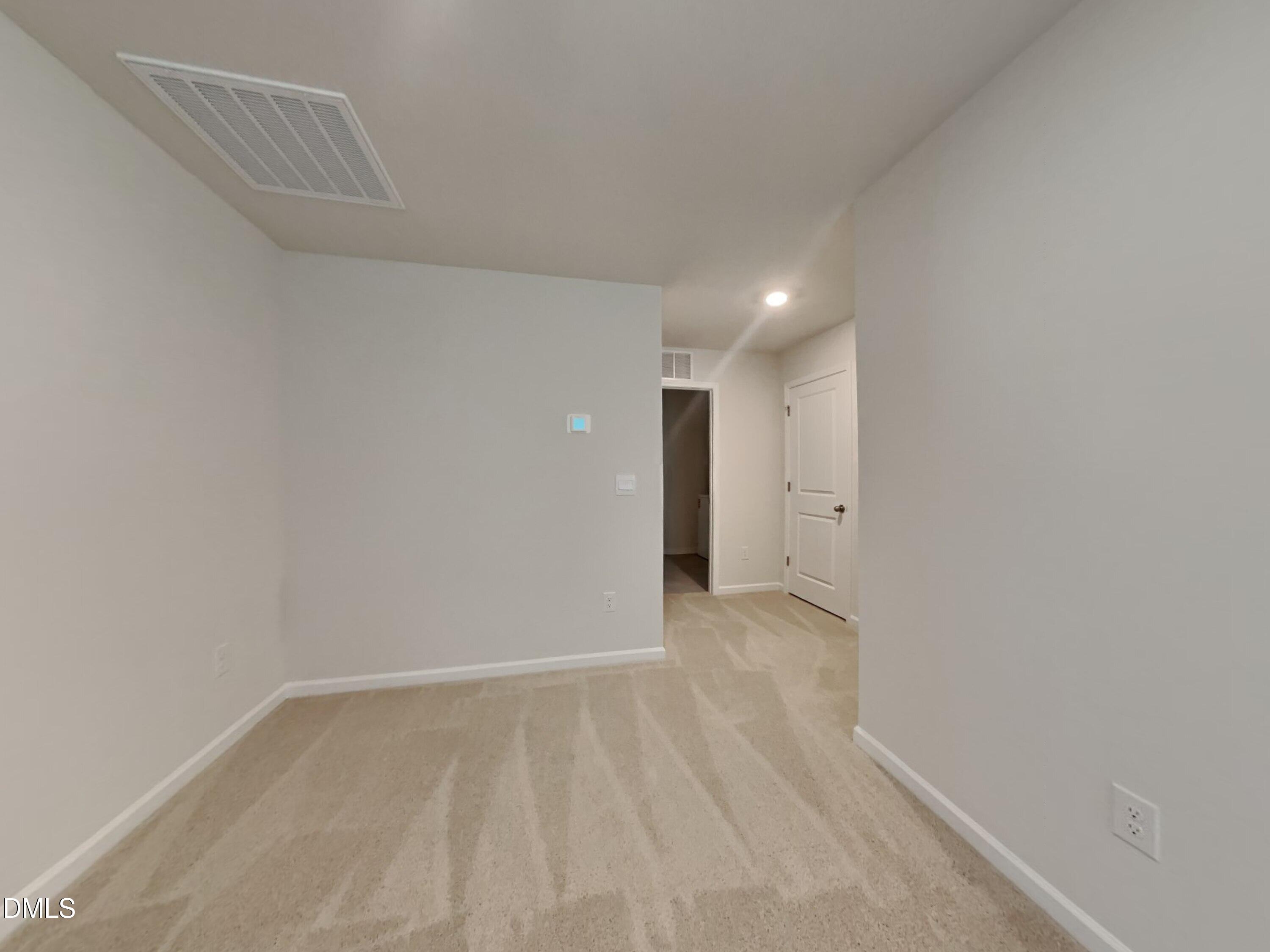 141 Chapel Drive Fuquay-Varina, NC 27526 - Photo 17 of 18 a view of an empty room