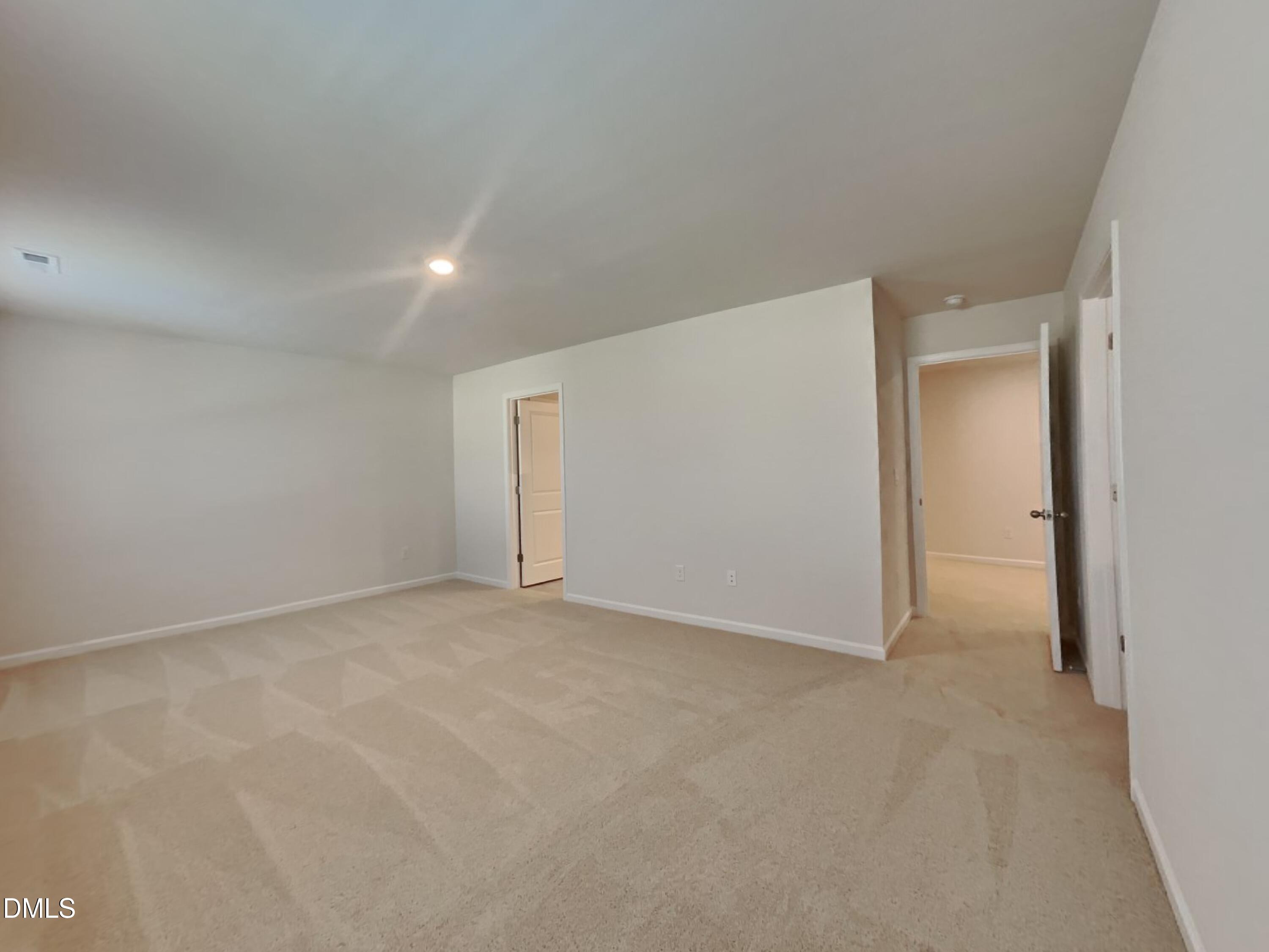141 Chapel Drive Fuquay-Varina, NC 27526 - Photo 5 of 18 a view of an empty room