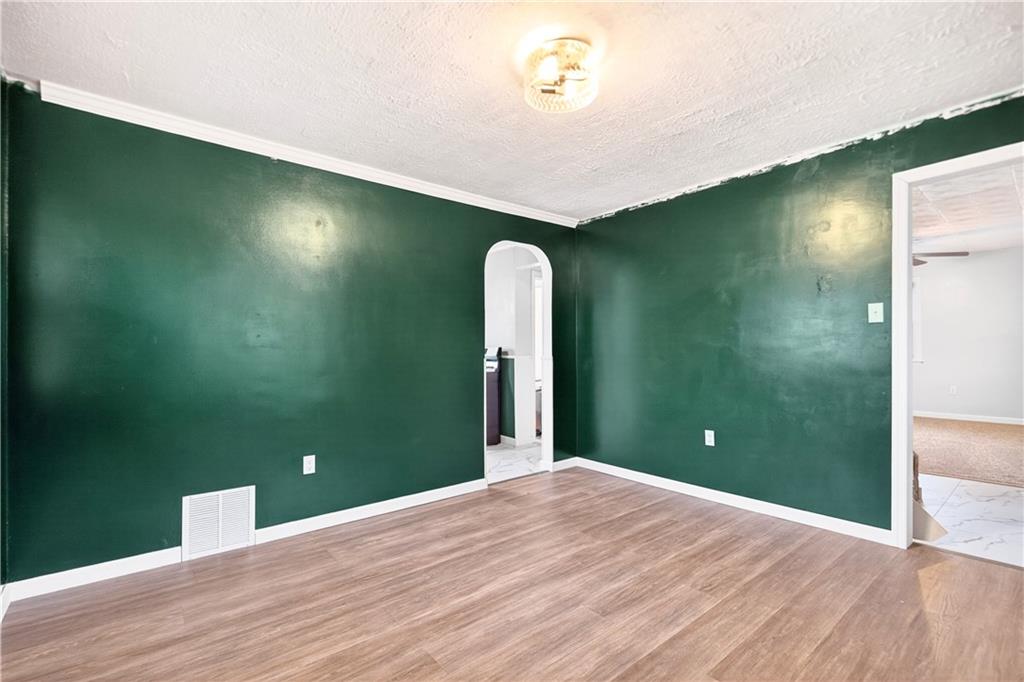 124 Bunker Hill Road Aliquippa, PA 15001 - Photo 21 of 37 a view of a room with a workspace