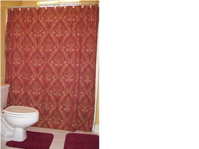 254 Ridge Lake Road Crestview, FL 32536 - Photo 21 of 29 a bathroom with a toilet and a shower