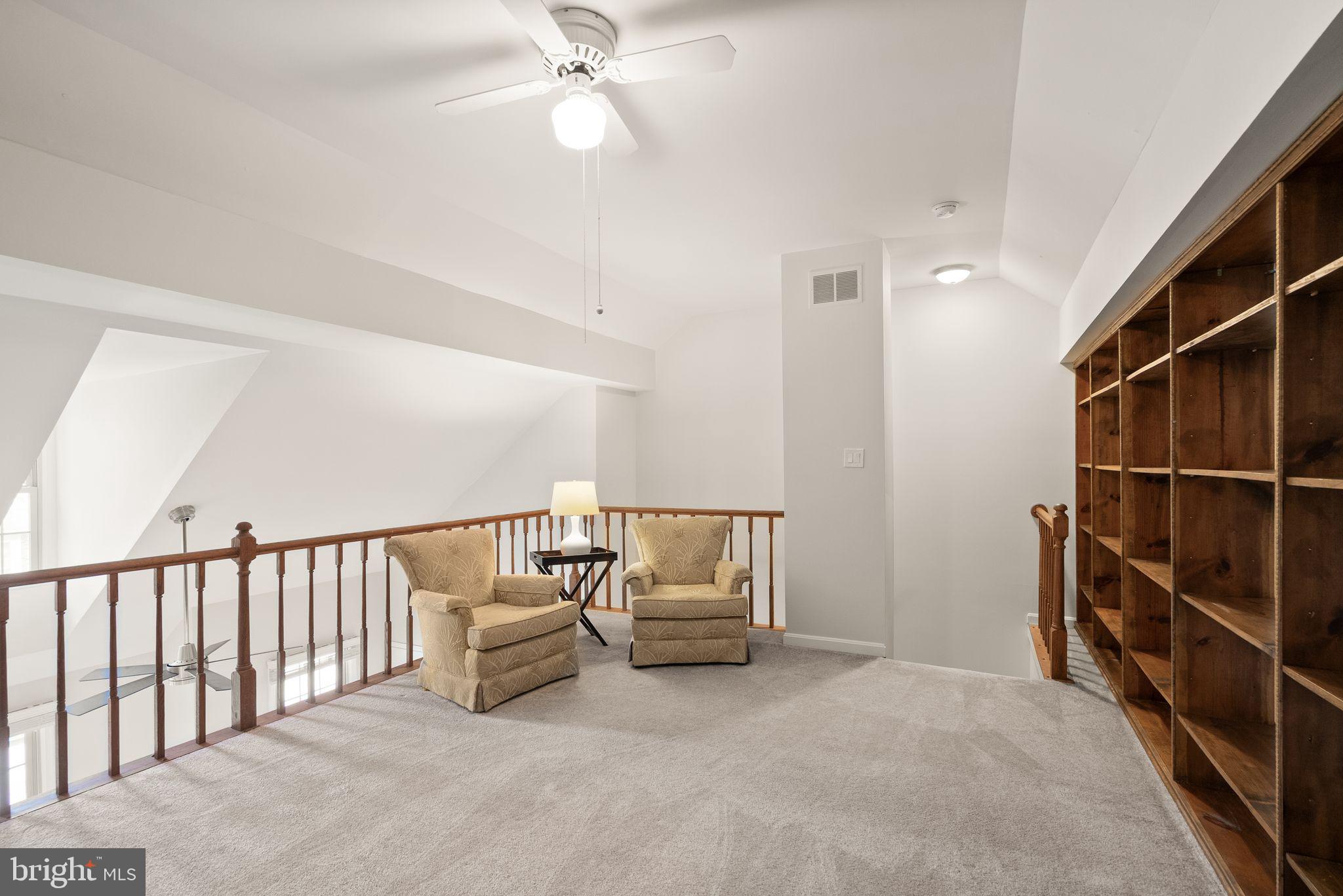 6369 English Ivy Way Springfield, VA 22152 - Photo 37 of 62 a view of an empty room with a staircase