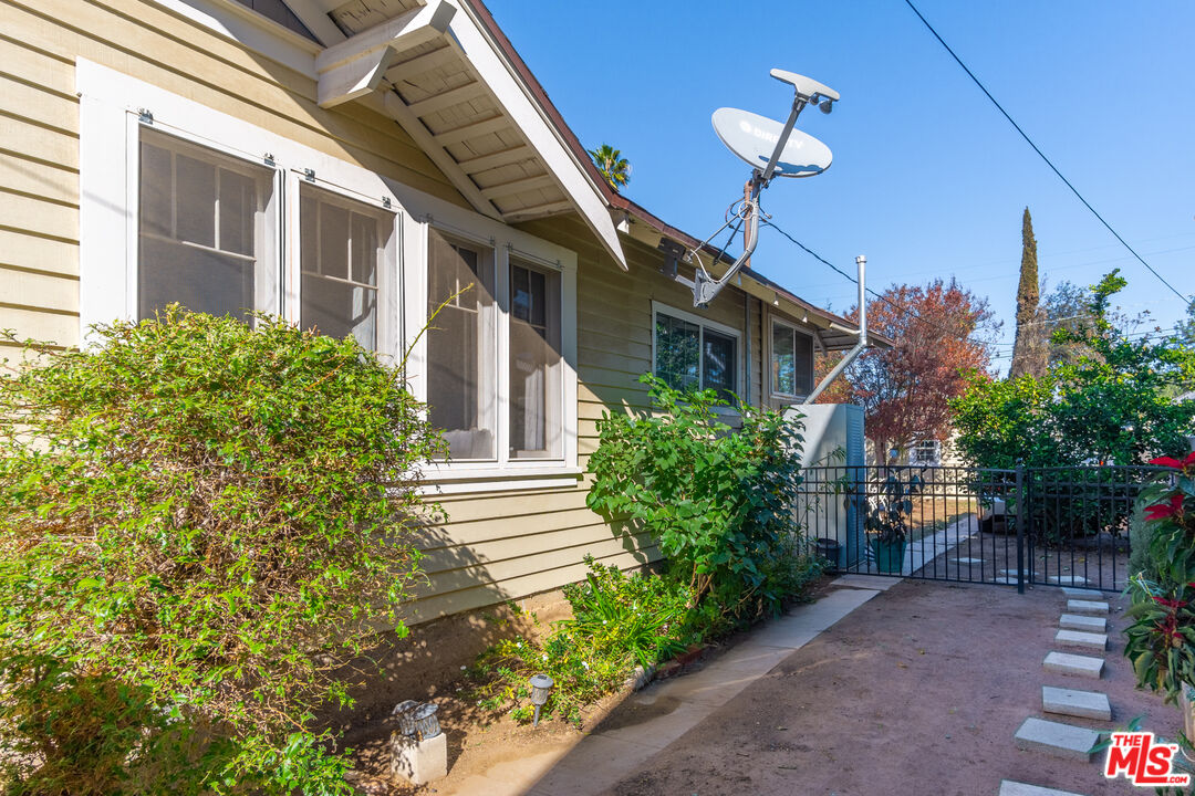 2715 Cridge Street Riverside, CA 92507 - Photo 23 of 25 a view of a house with potted plants