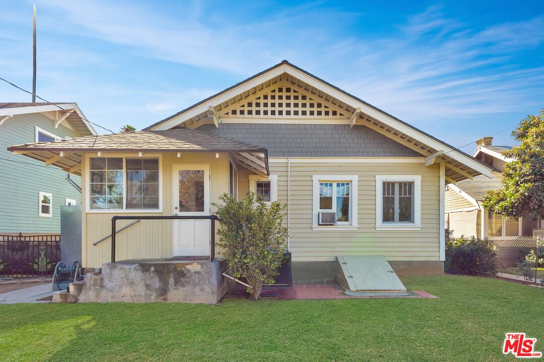 2715 Cridge Street Riverside, CA 92507 - Photo 25 of 25 a view of a house with a yard