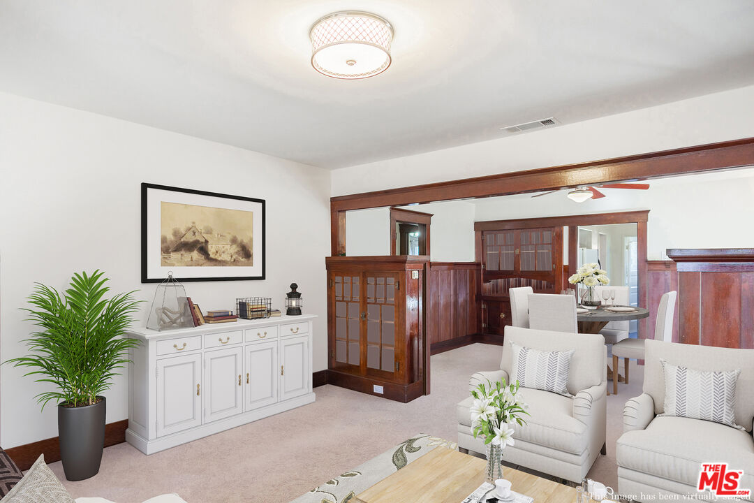 2715 Cridge Street Riverside, CA 92507 - Photo 7 of 25 a living room with furniture flowerpot and a potted plant