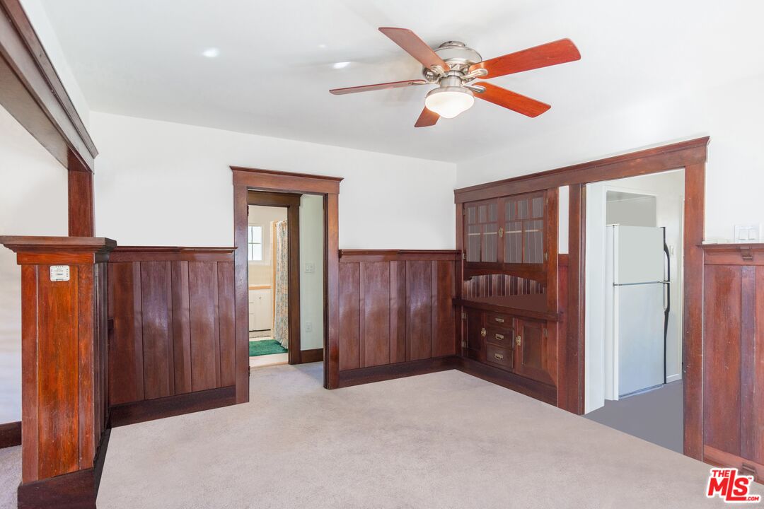 2715 Cridge Street Riverside, CA 92507 - Photo 8 of 25 an empty room with closet and ceiling fan