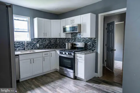 a sink with a mirror