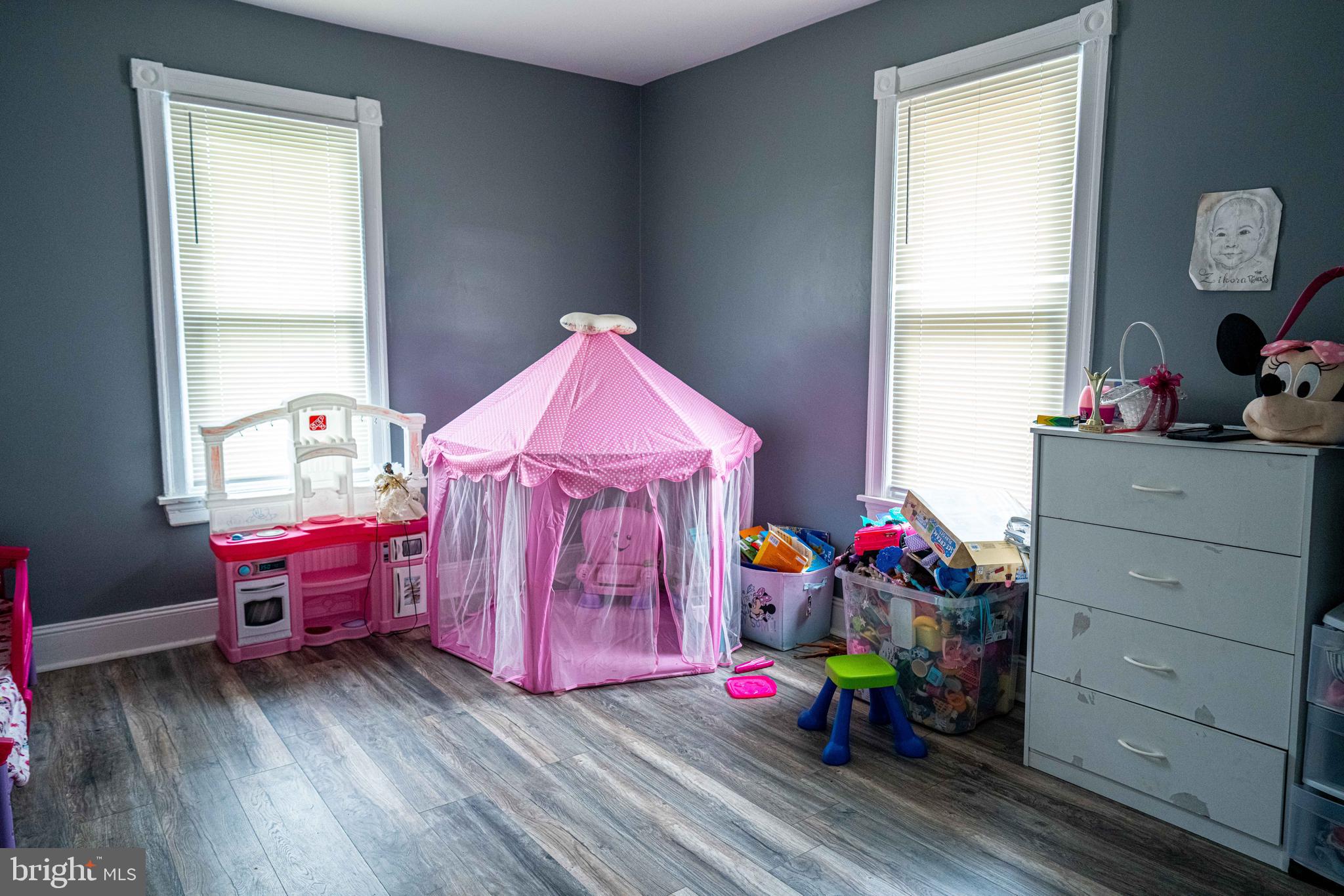 51 Lewis Avenue, Unit A Lansdowne, PA 19050 - Photo 25 of 28 a living room with furniture and a wooden floor