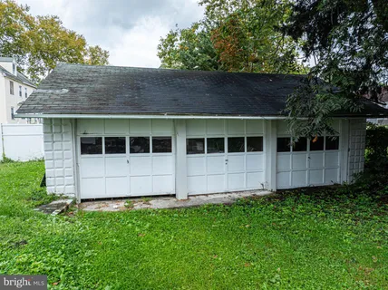 a large house with a large window in front of it
