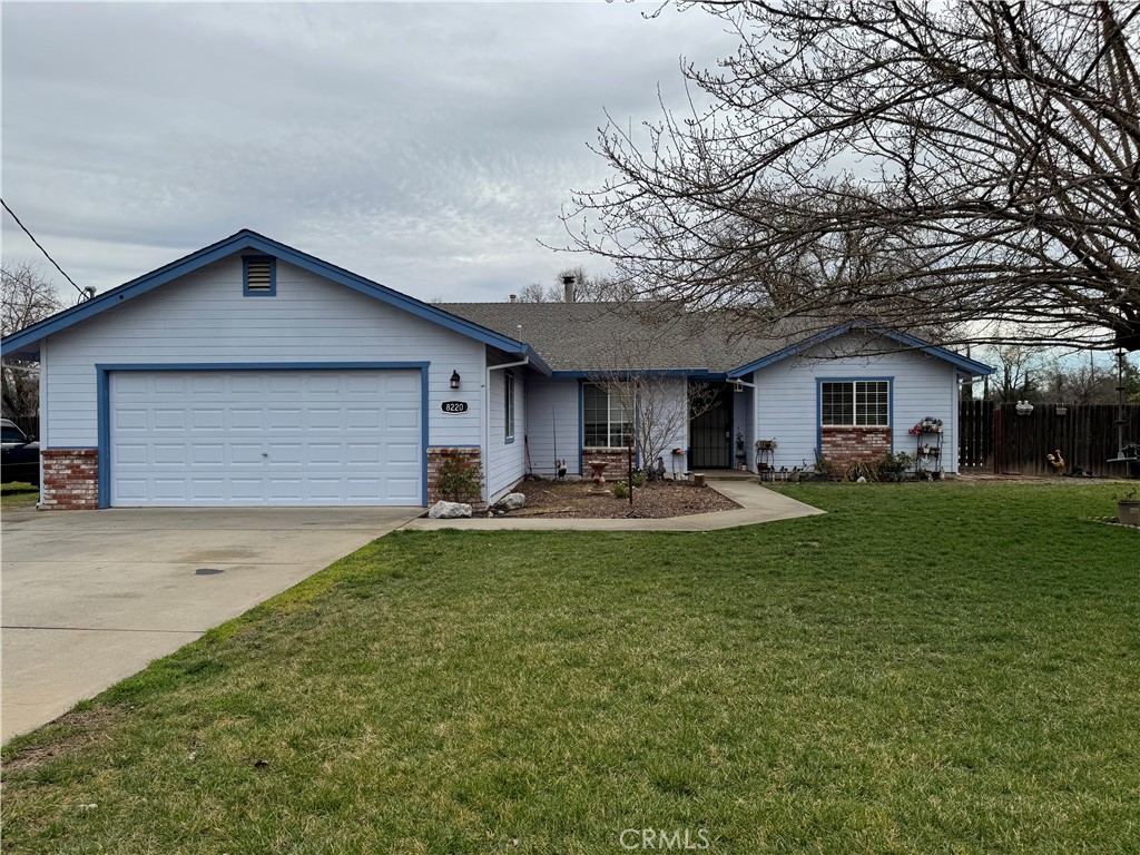 8220 Marek Road Los Molinos, CA 96055 - Photo 1 of 27 a front view of house with yard and green space