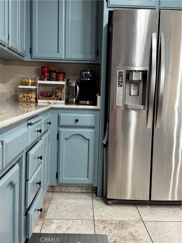 8220 Marek Road Los Molinos, CA 96055 - Photo 11 of 27 a kitchen with stainless steel appliances granite countertop a refrigerator a stove and cabinets