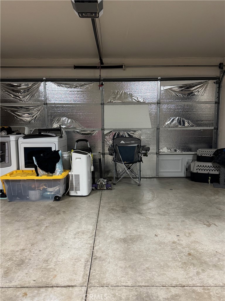 8220 Marek Road Los Molinos, CA 96055 - Photo 14 of 27 a view of parking garage with cars