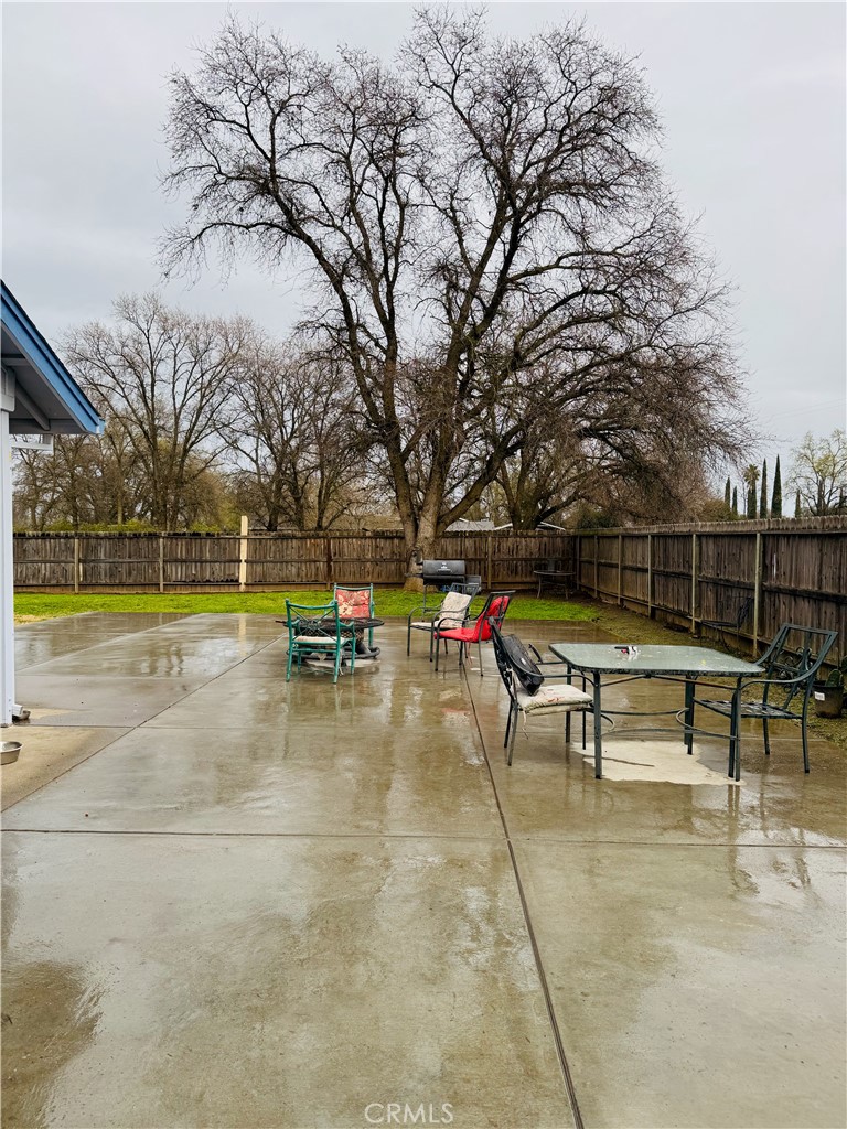8220 Marek Road Los Molinos, CA 96055 - Photo 22 of 27 a view of a swimming pool with a bench and trees