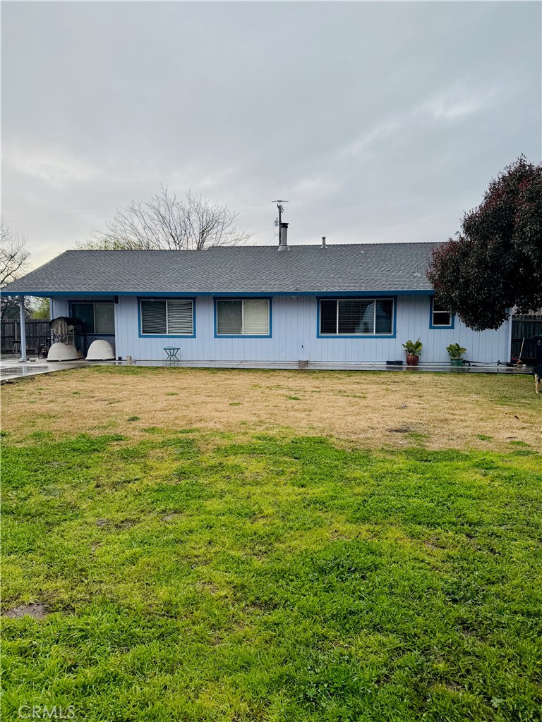 8220 Marek Road Los Molinos, CA 96055 - Photo 6 of 27 a front view of a house with a yard