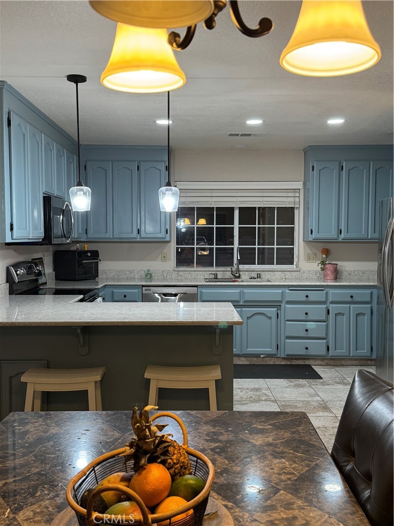 8220 Marek Road Los Molinos, CA 96055 - Photo 10 of 27 a kitchen with a sink cabinets and window