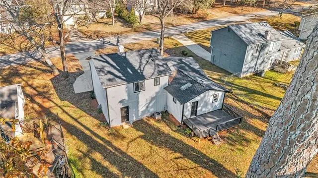 a view of a house with a small yard