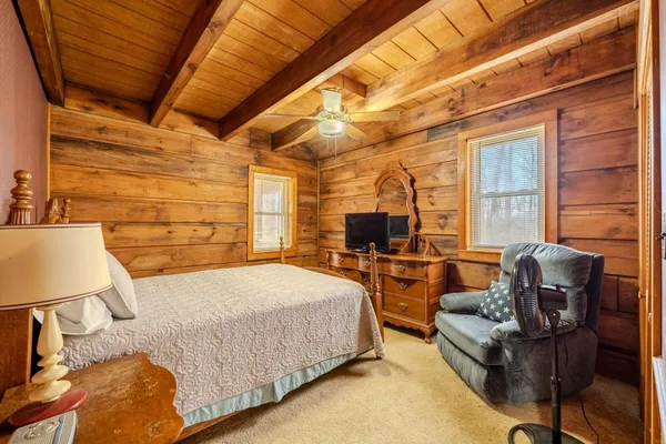 a bed room with a bed and a couch