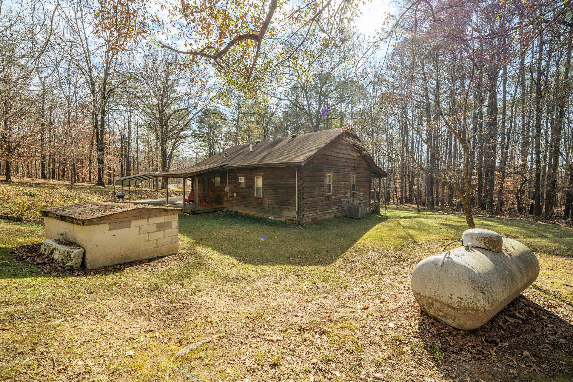 165 Cr 321 Road Iuka, MS 38852 - Photo 27 of 40 a view of a swimming pool with a yard