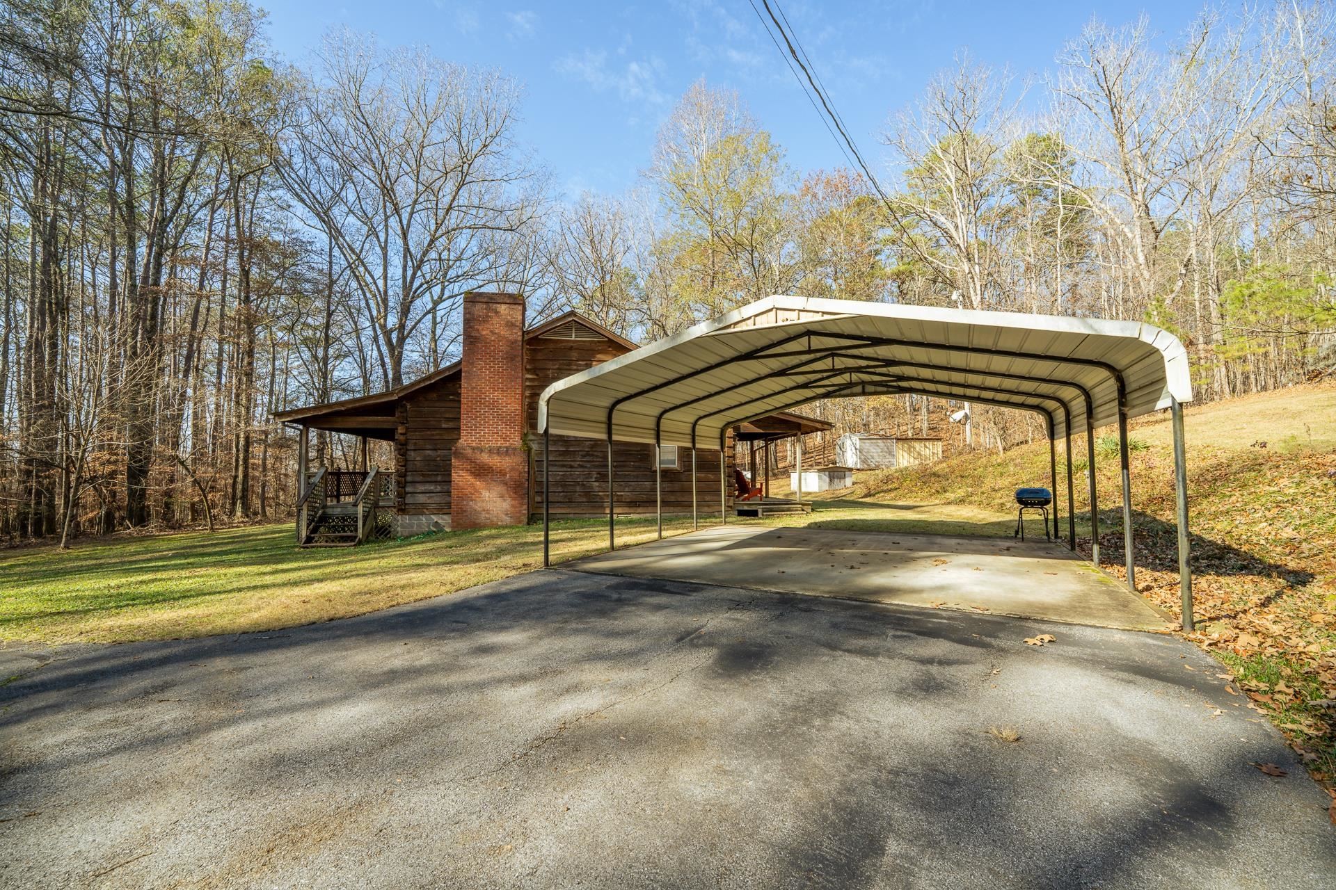 165 Cr 321 Road Iuka, MS 38852 - Photo 32 of 40 a view of a house with a roof deck