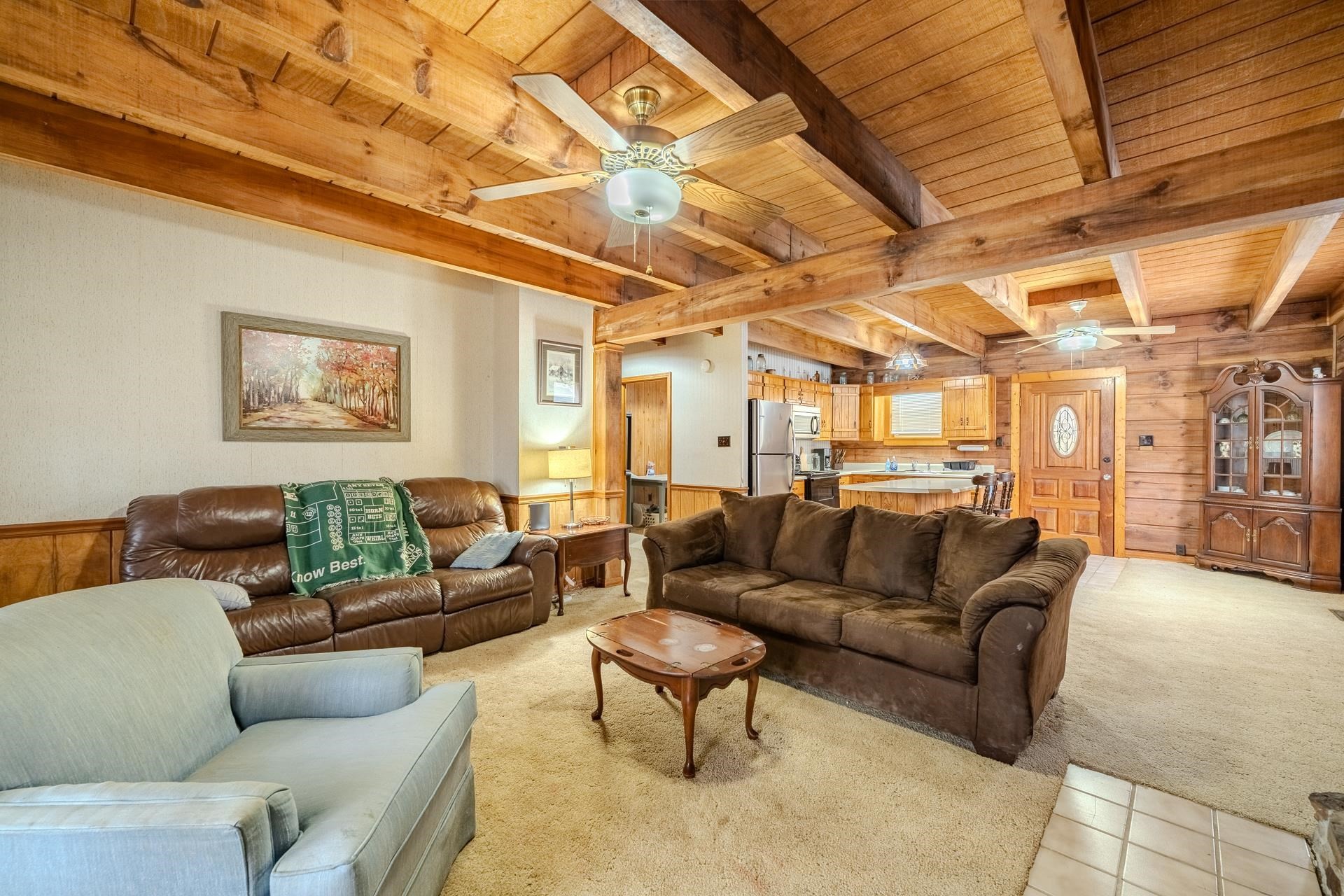 165 Cr 321 Road Iuka, MS 38852 - Photo 7 of 40 a living room with furniture a couch and a ceiling fan