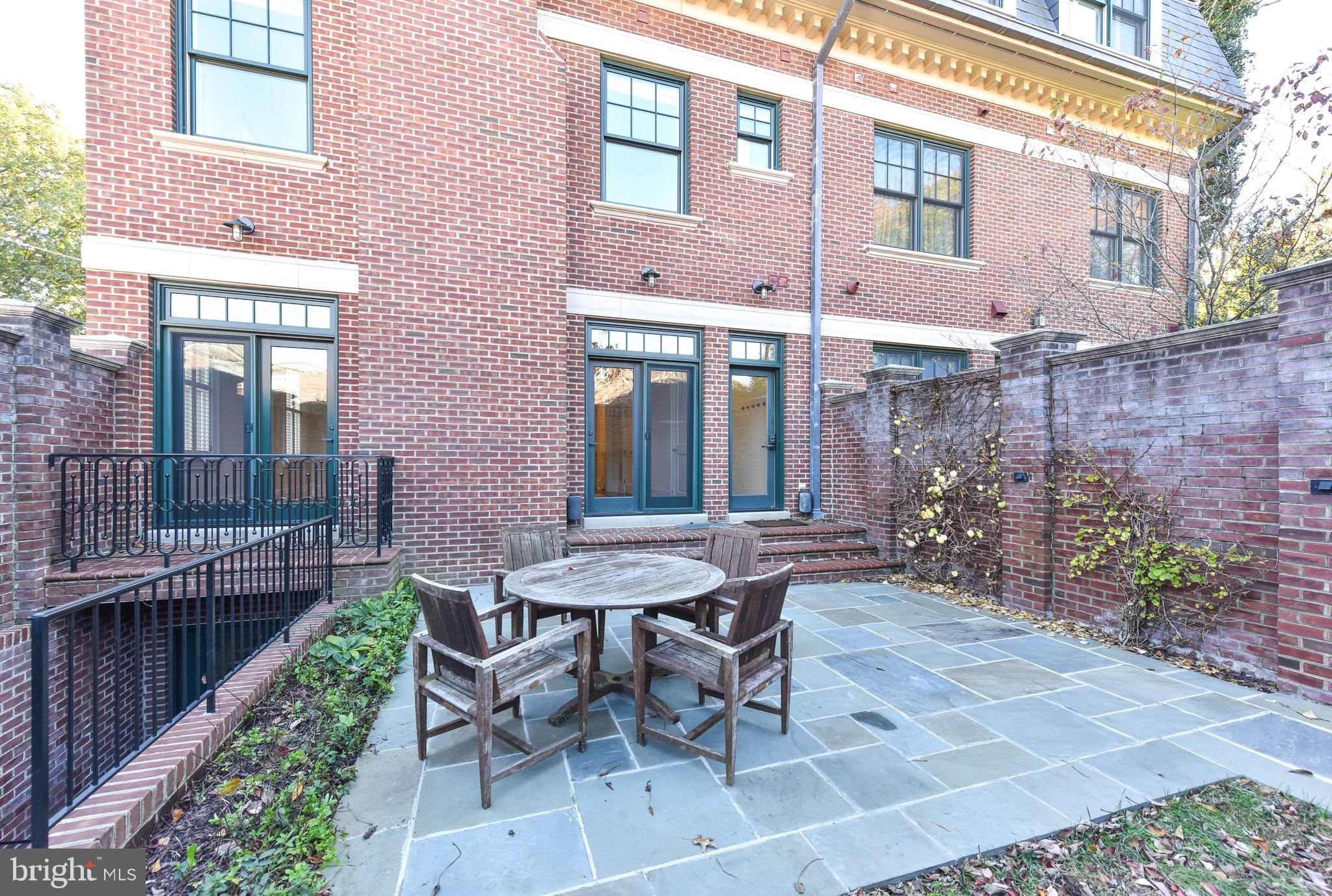 2733 Cathedral Avenue Northwest Washington, DC 20008 - Photo 9 of 10 a view of a patio with a table and chairs