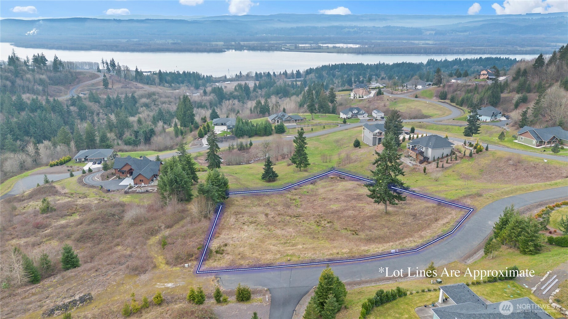 202 Windy River Road Kalama, WA 98625 - Photo 4 of 12 an aerial view of a house with a yard