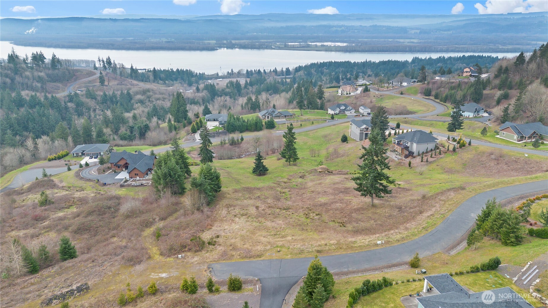 202 Windy River Road Kalama, WA 98625 - Photo 9 of 12 an aerial view of a house with a yard basket ball court