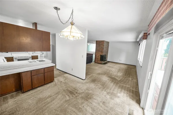 a spacious bathroom with a double vanity sink a mirror and a shower