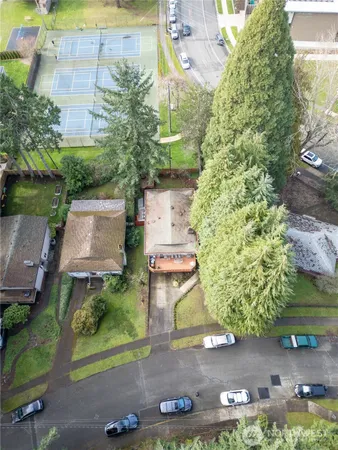 an aerial view of a house with a garden