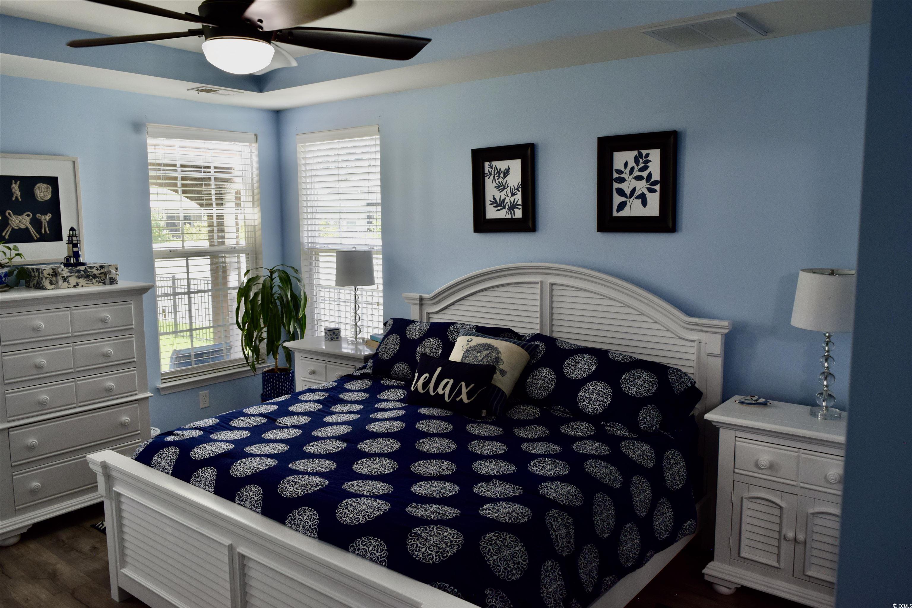 324 Oak Haven Drive Murrells Inlet, SC 29576 - Photo 19 of 38 Bedroom with dark wood finished floors and ceiling fan