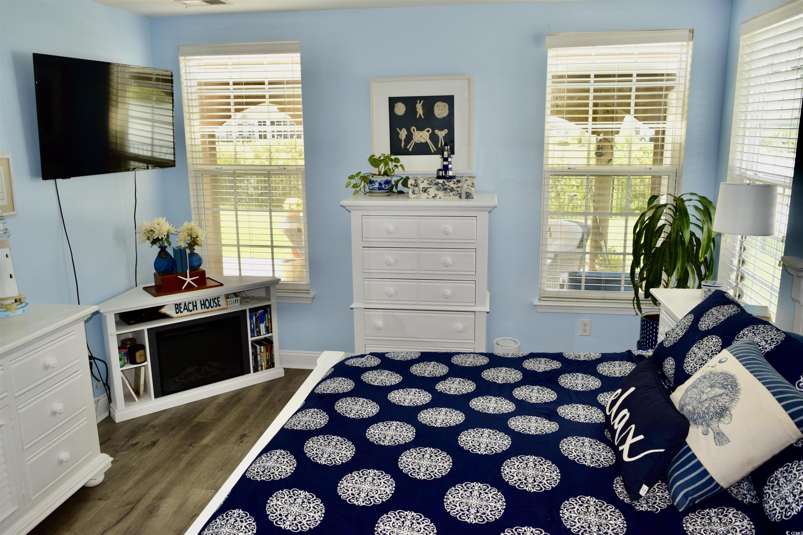 324 Oak Haven Drive Murrells Inlet, SC 29576 - Photo 20 of 38 Bedroom featuring dark wood-type flooring and baseboards
