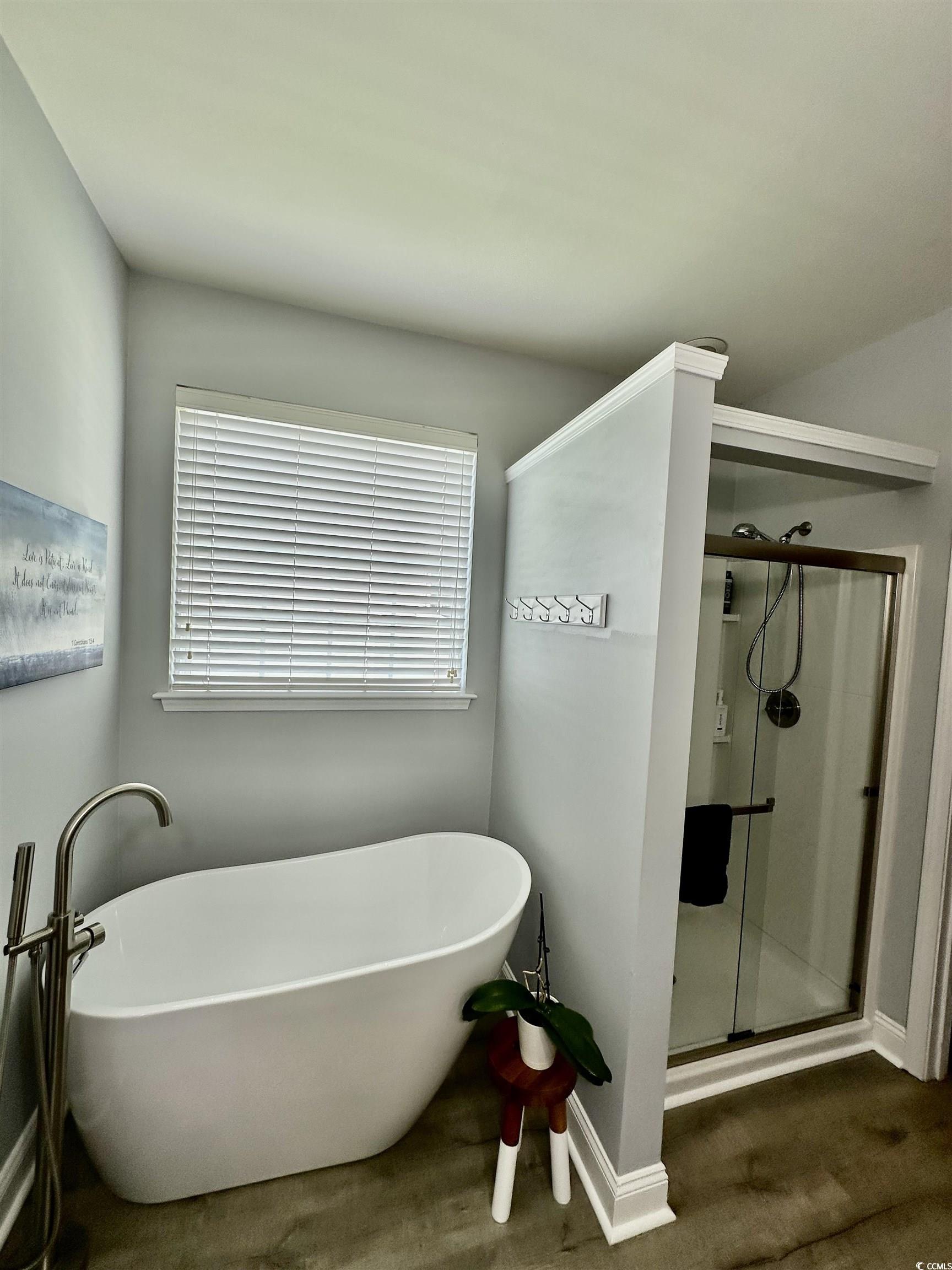 324 Oak Haven Drive Murrells Inlet, SC 29576 - Photo 22 of 38 Bathroom with a shower stall and a freestanding tub