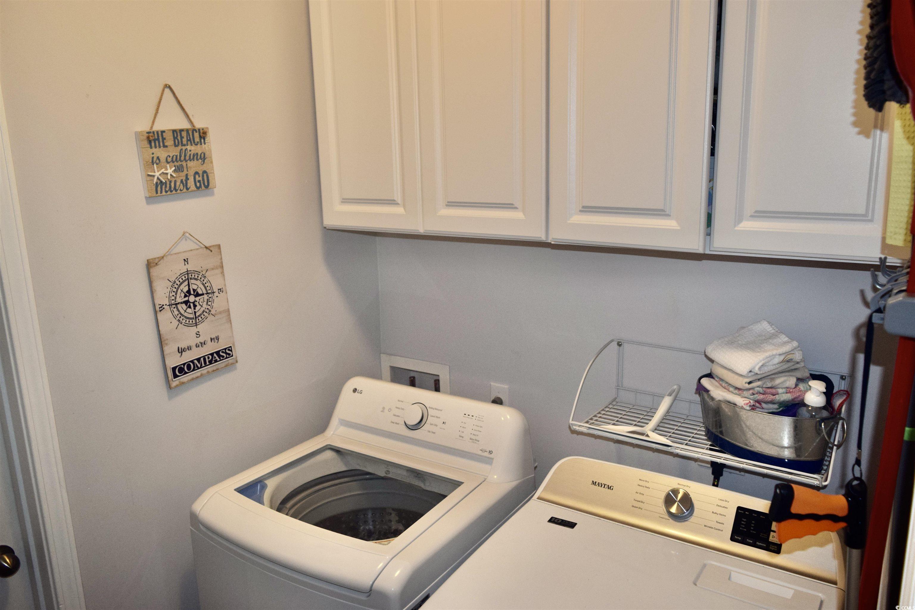 324 Oak Haven Drive Murrells Inlet, SC 29576 - Photo 34 of 38 Laundry room featuring cabinet space and separate washer and dryer