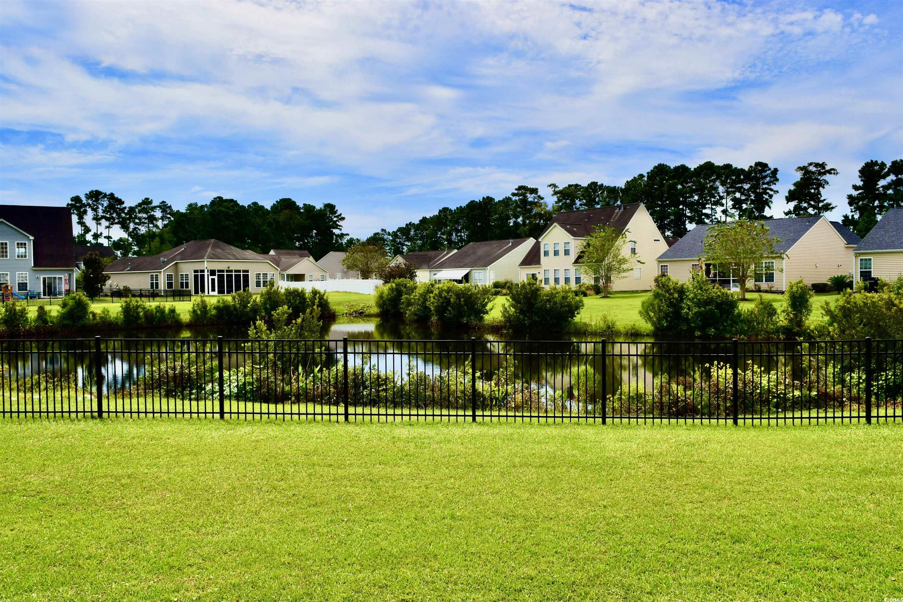 324 Oak Haven Drive Murrells Inlet, SC 29576 - Photo 38 of 38 View of yard with a residential view and a water view