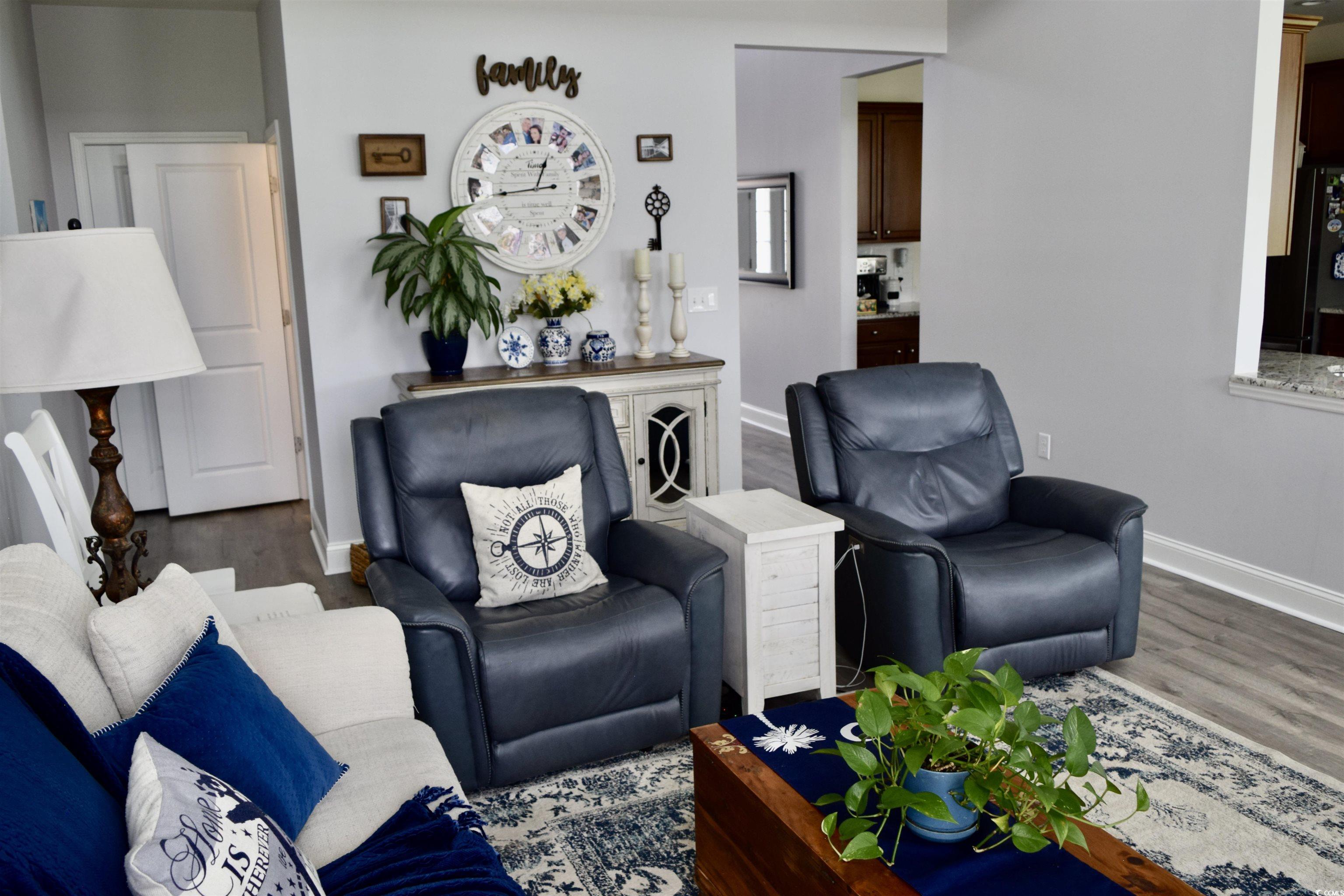 324 Oak Haven Drive Murrells Inlet, SC 29576 - Photo 5 of 38 Living area with baseboards and wood finished floors
