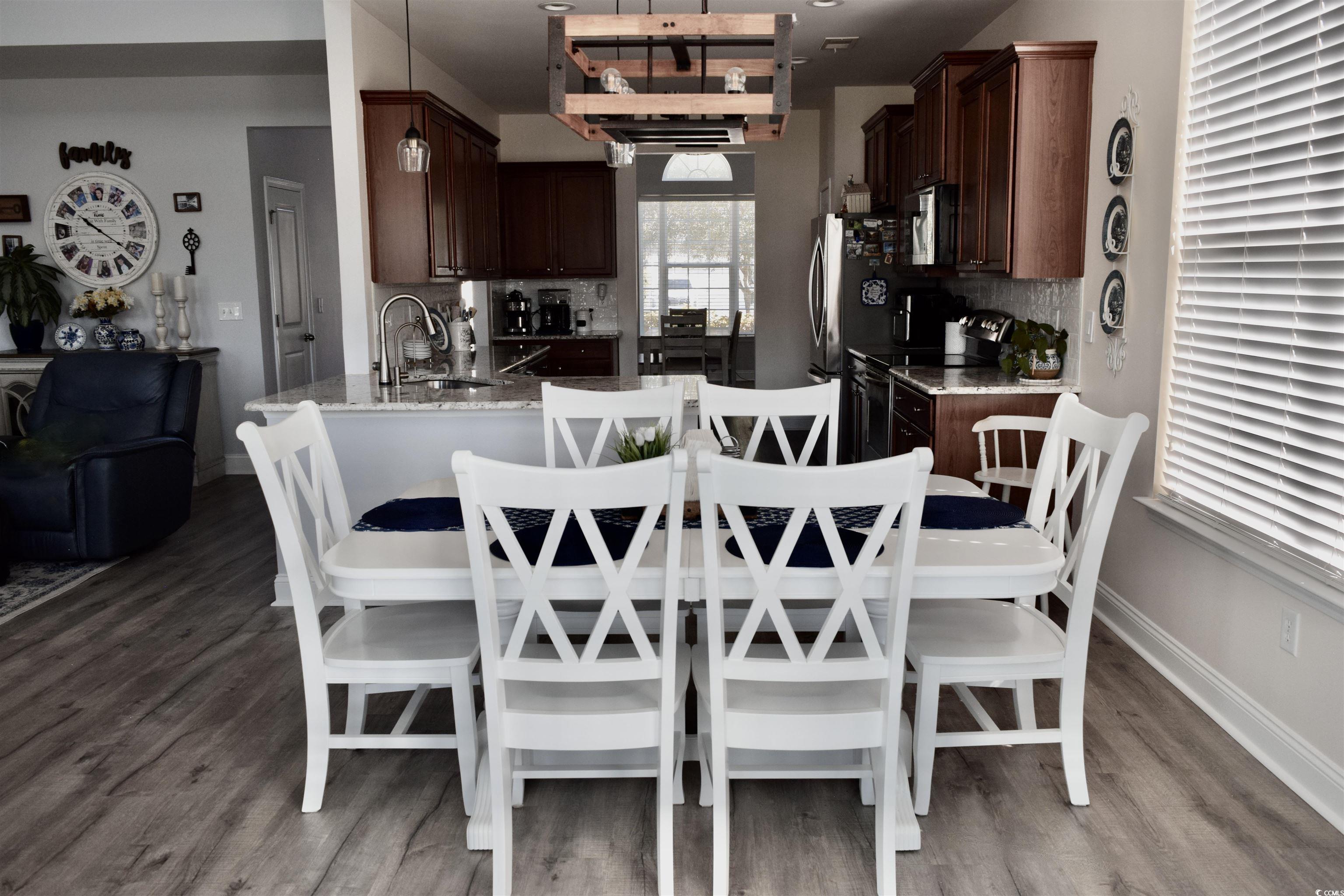 324 Oak Haven Drive Murrells Inlet, SC 29576 - Photo 9 of 38 Dining area with light wood finished floors