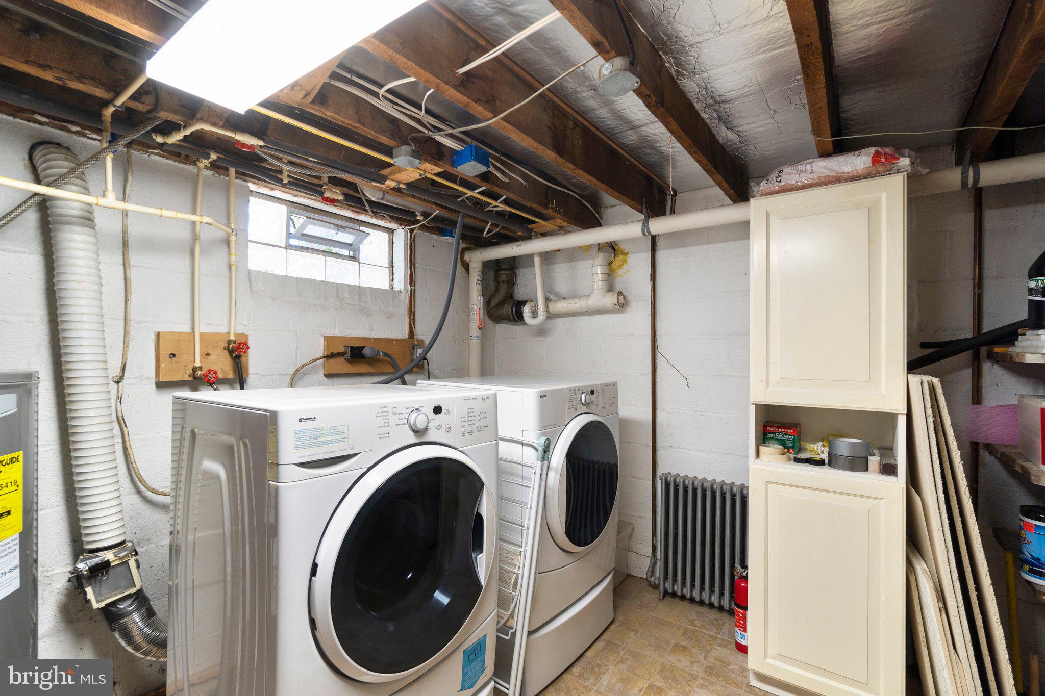 5718 Shookstown Road Frederick, MD 21702 - Photo 26 of 32 a utility room with dryer and washer