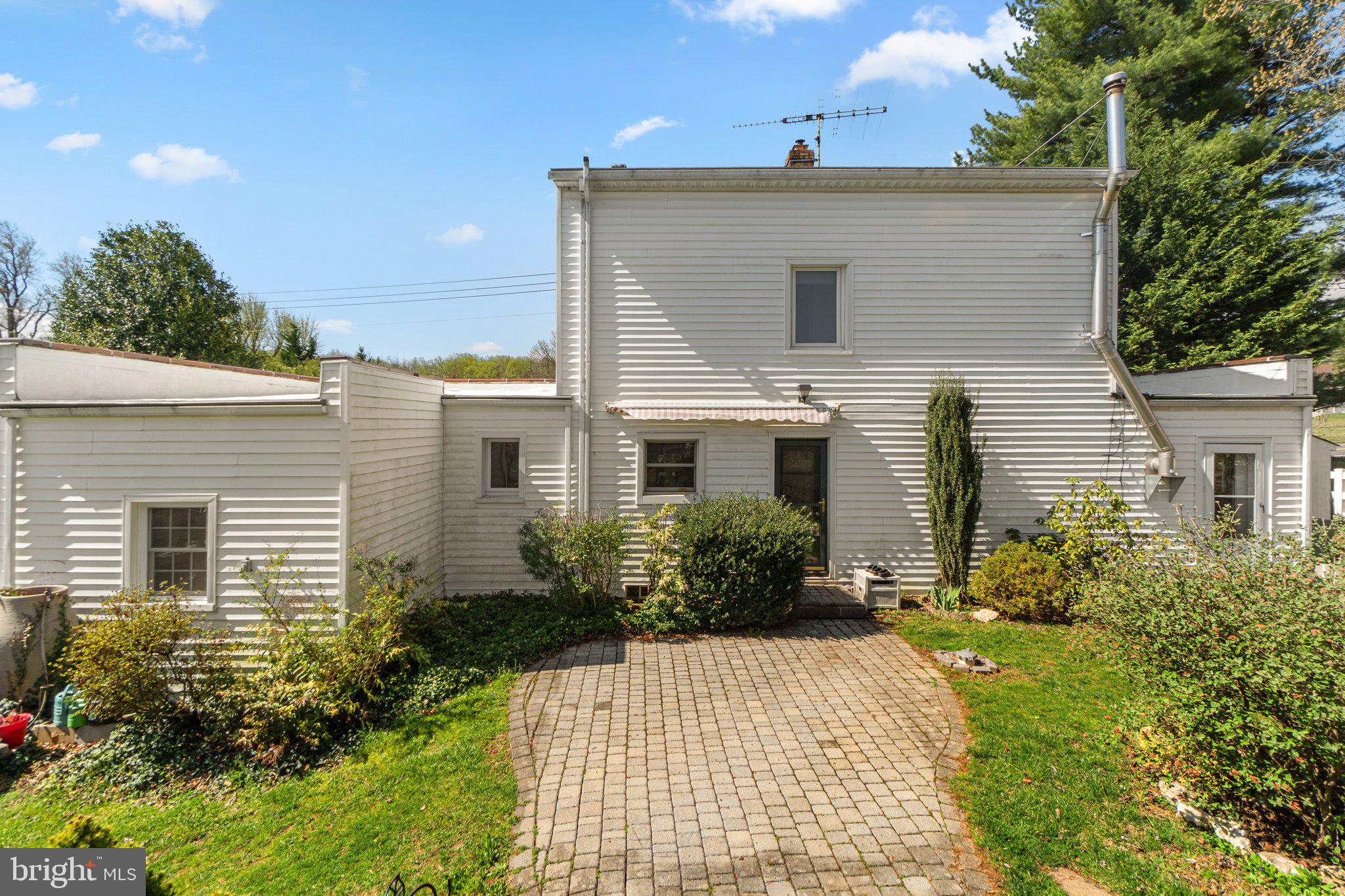 5718 Shookstown Road Frederick, MD 21702 - Photo 29 of 32 a view of a house with a yard