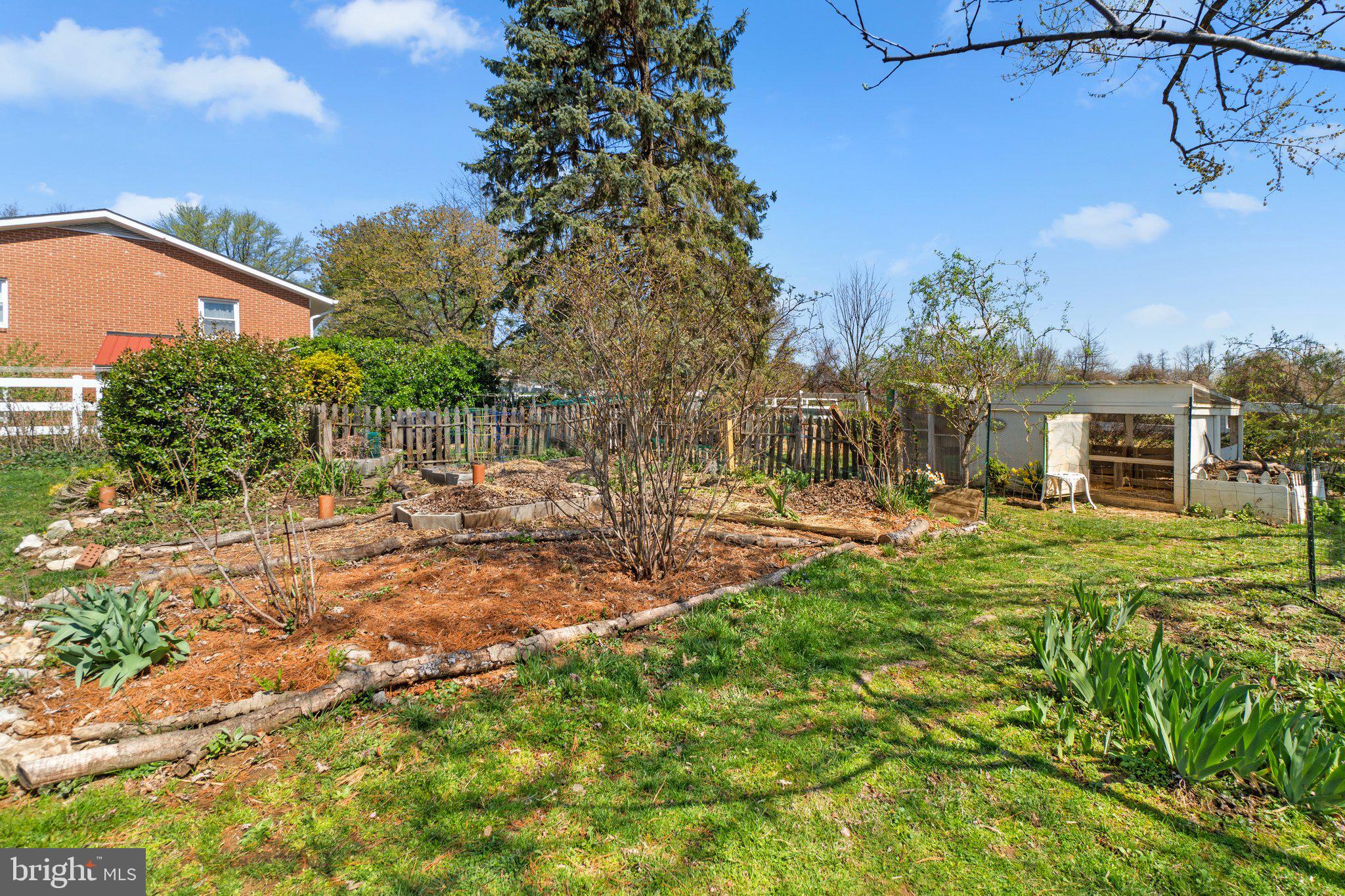 5718 Shookstown Road Frederick, MD 21702 - Photo 32 of 32 a view of a house with backyard and sitting area