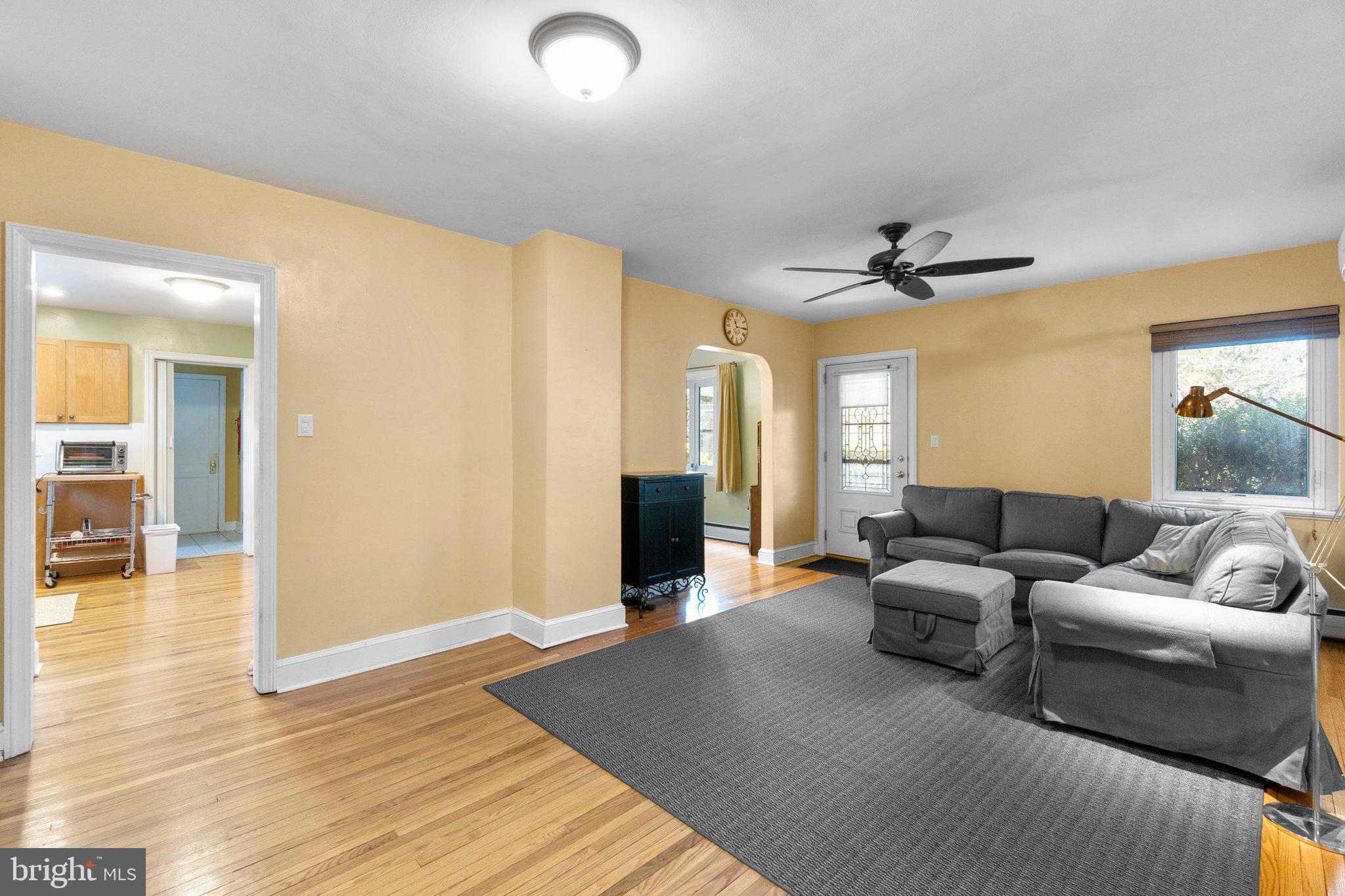 5718 Shookstown Road Frederick, MD 21702 - Photo 4 of 32 a living room with furniture and a wooden floor