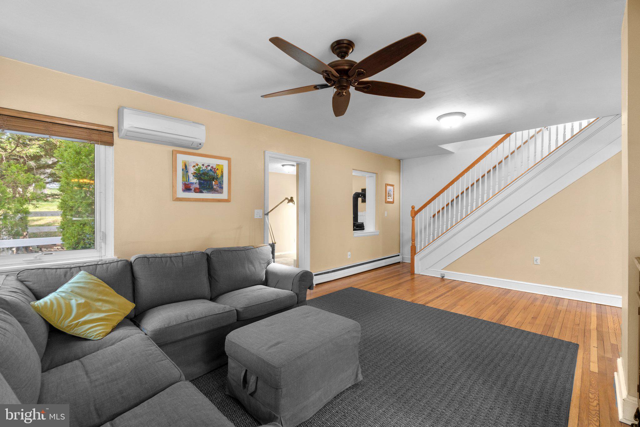 5718 Shookstown Road Frederick, MD 21702 - Photo 5 of 32 a living room with furniture and a large window