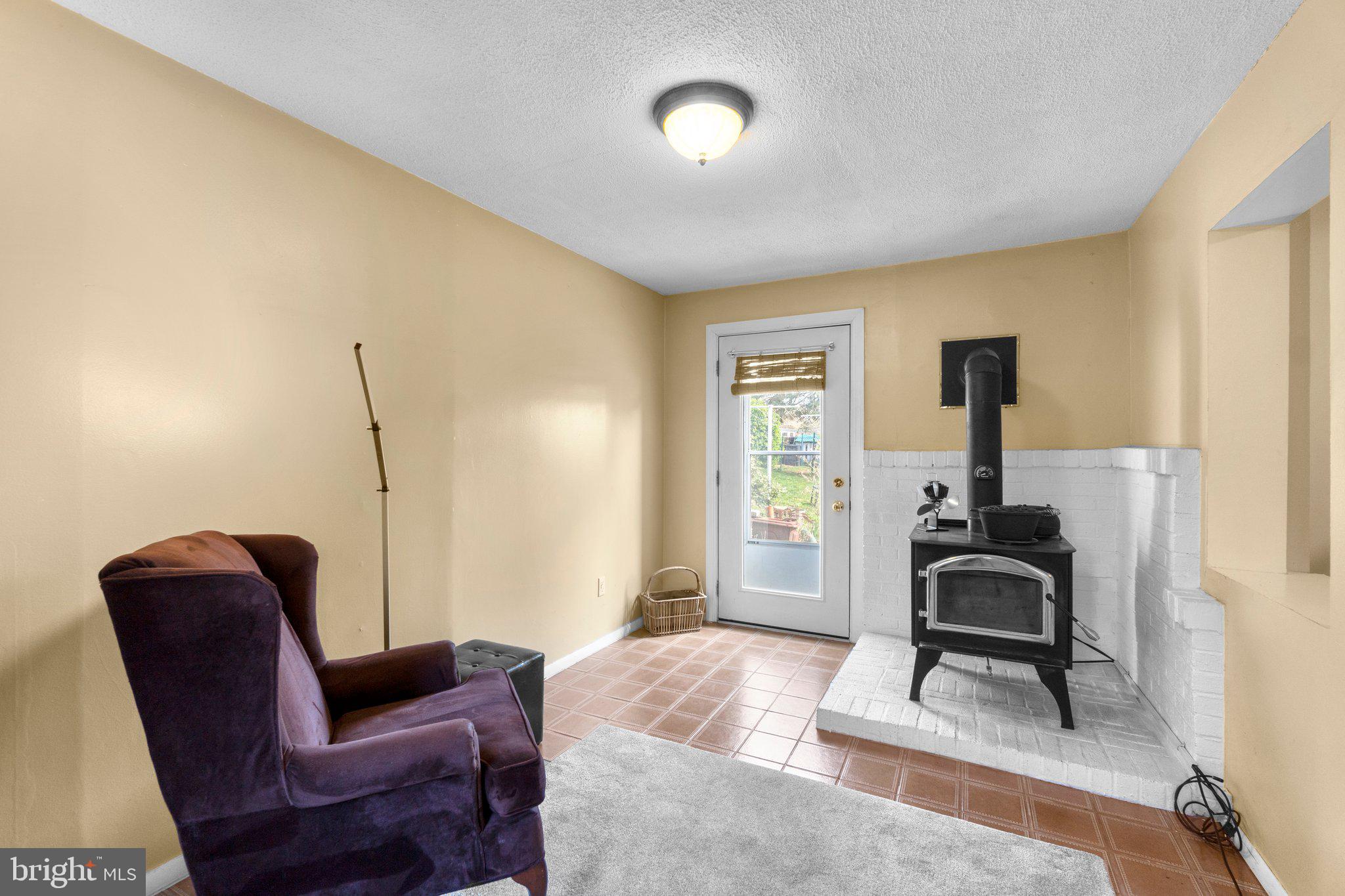 5718 Shookstown Road Frederick, MD 21702 - Photo 6 of 32 a living room with furniture and a window