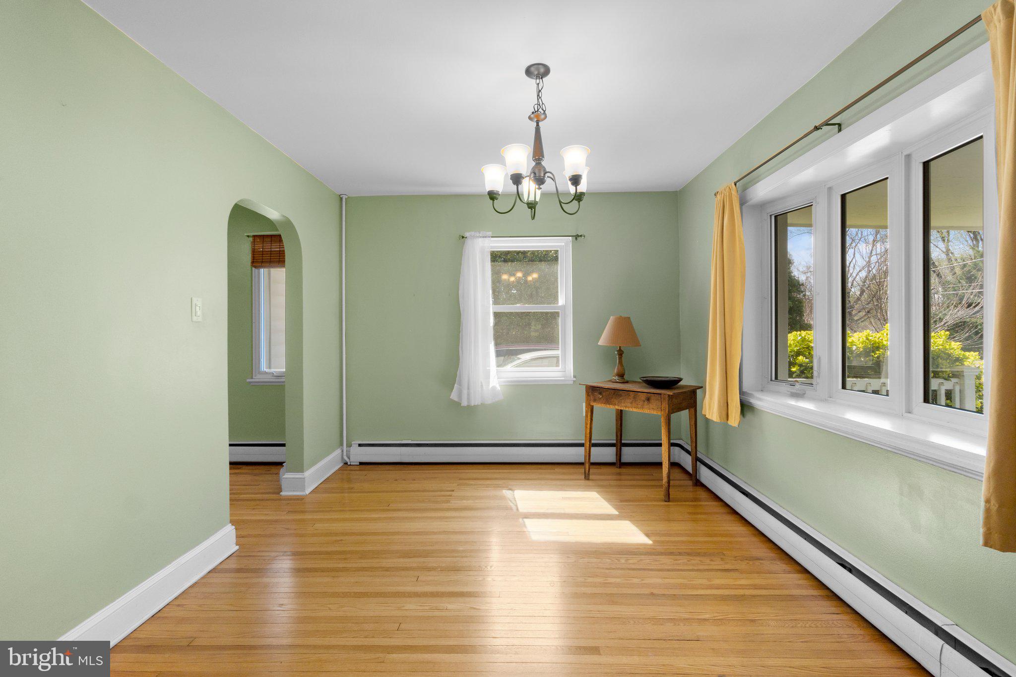 5718 Shookstown Road Frederick, MD 21702 - Photo 8 of 32 a living room with furniture window and wooden floor